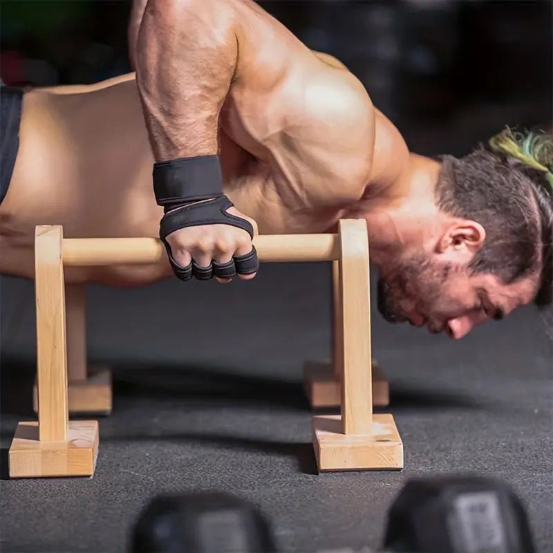Athlete doing push-ups wearing silicone weightlifting gloves