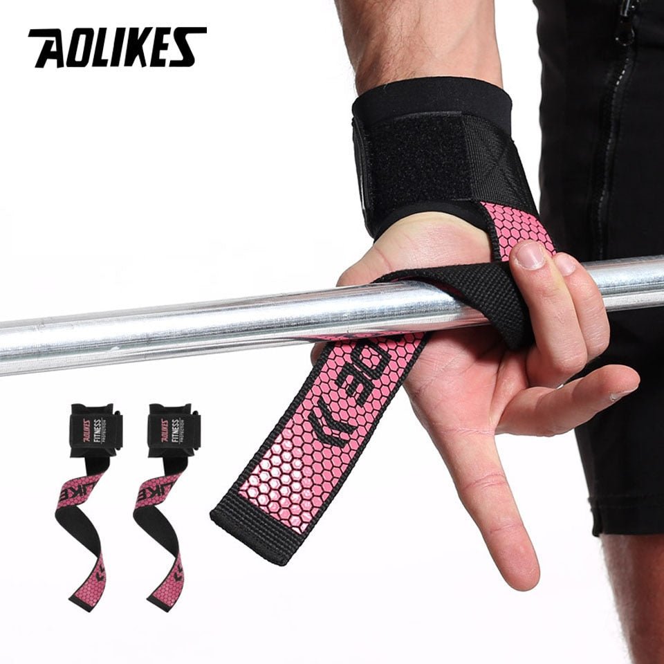 Pink weightlifting strap wrapped around barbell